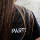 immagine di ragazza di schiena con maglietta evento architects
